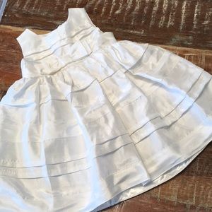 Bright white silky infant formal dress